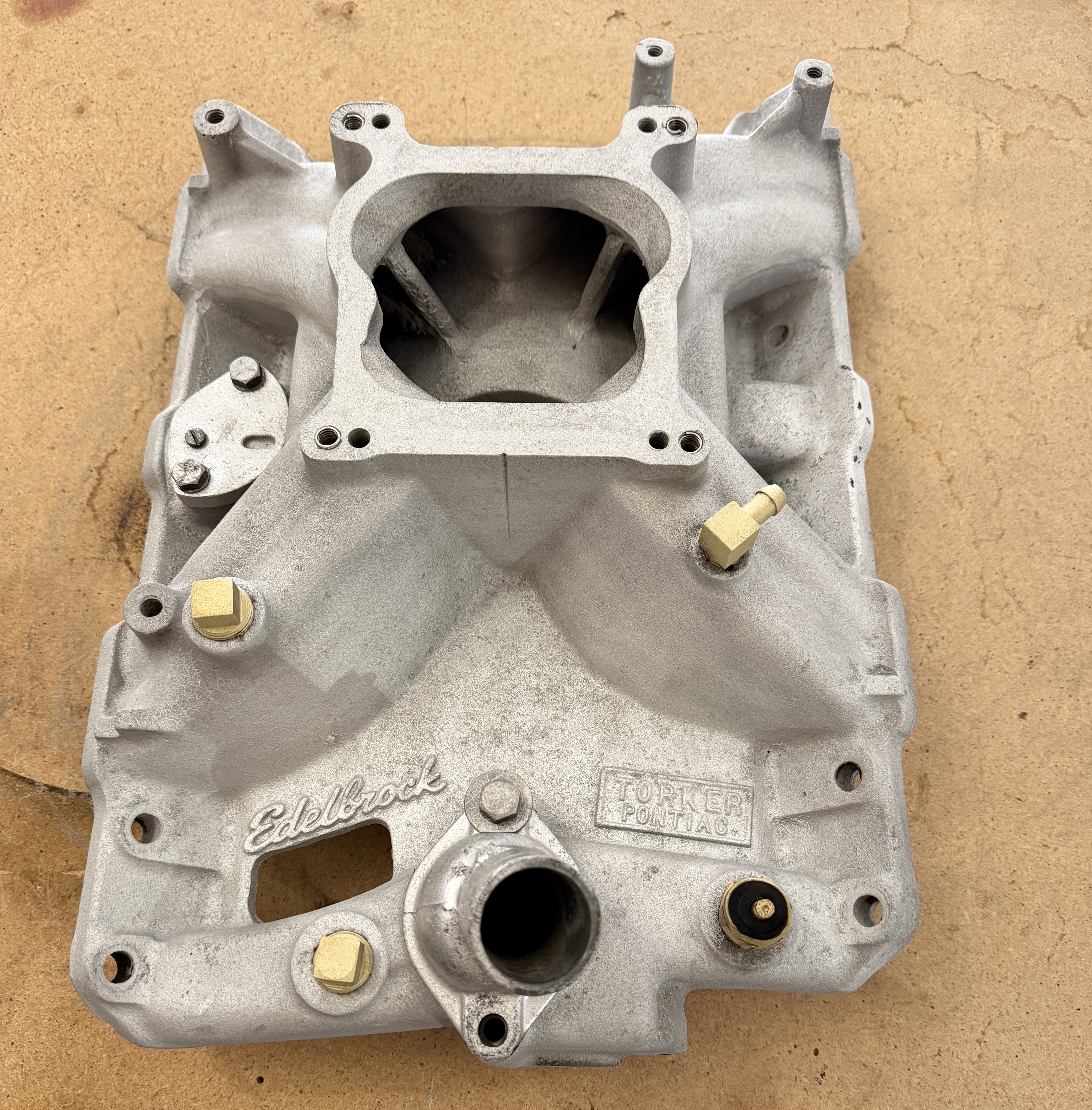 Pontiac intake manifold after laser cleaning with bare aluminum restored