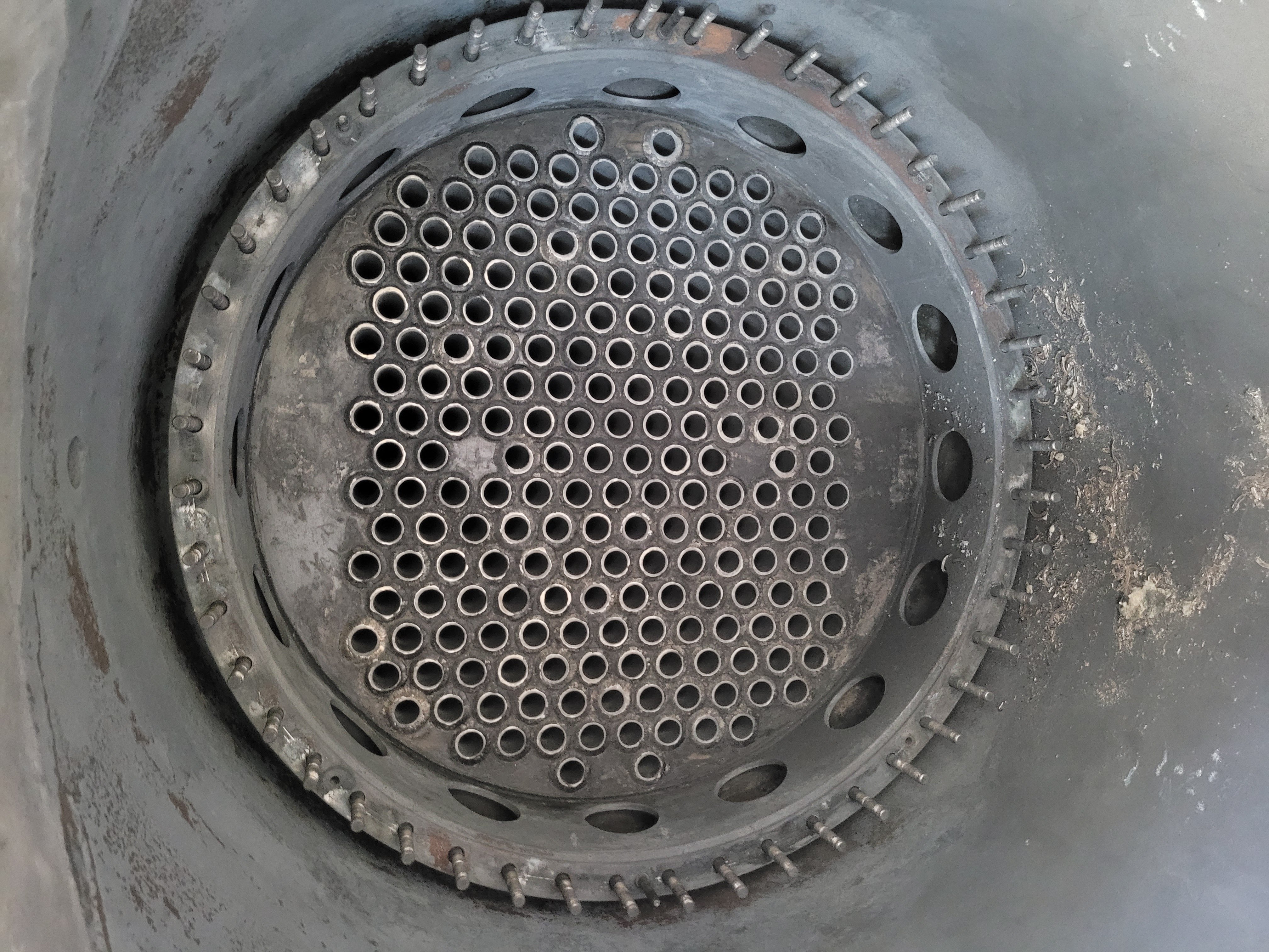 Tube sheet with heavy contamination before laser cleaning