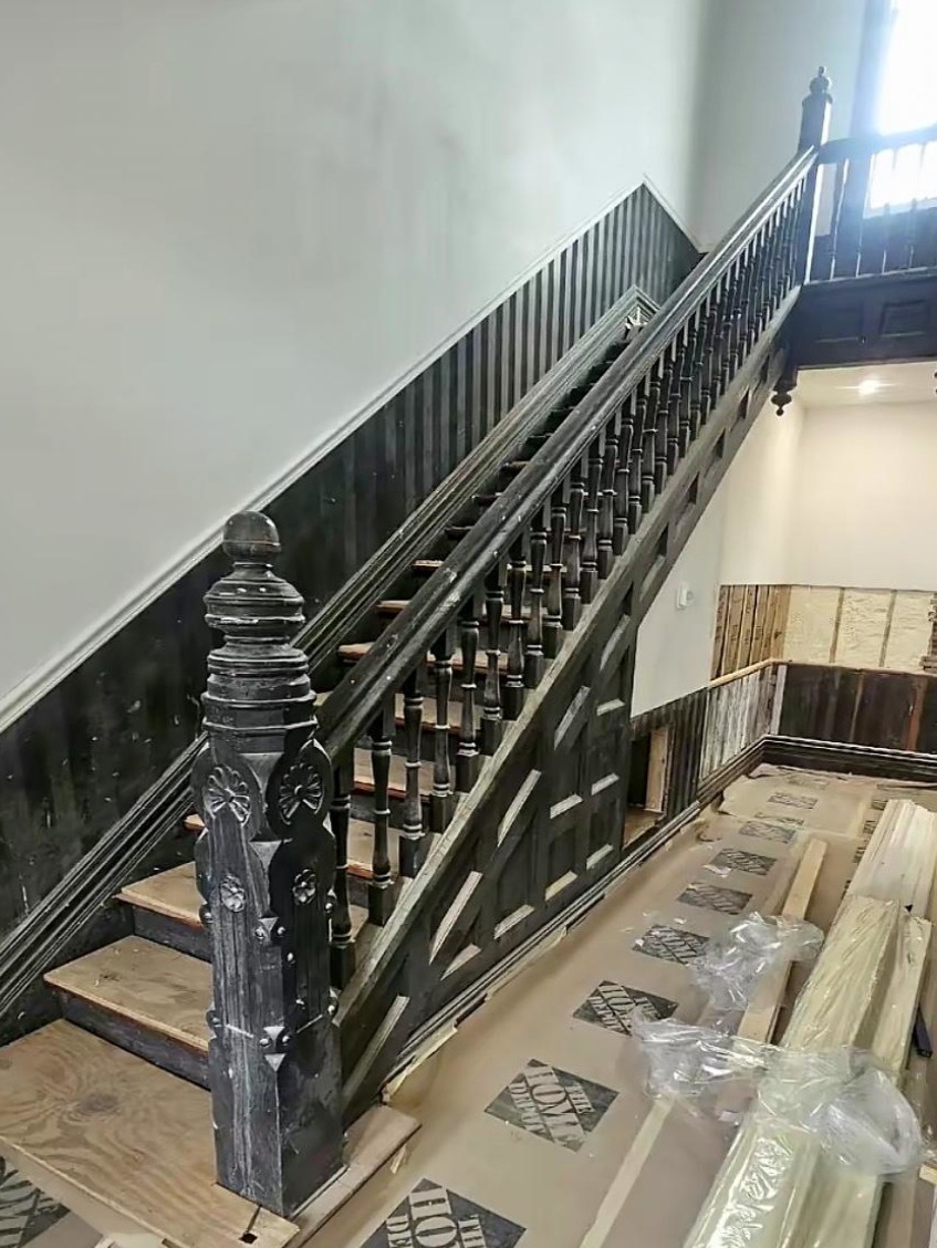 Wooden staircase with surface contamination before laser cleaning
