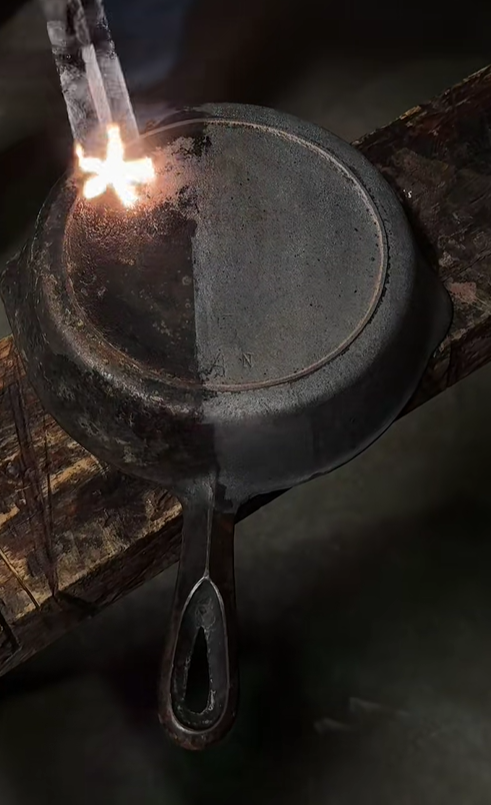 Cast iron piece during laser cleaning process